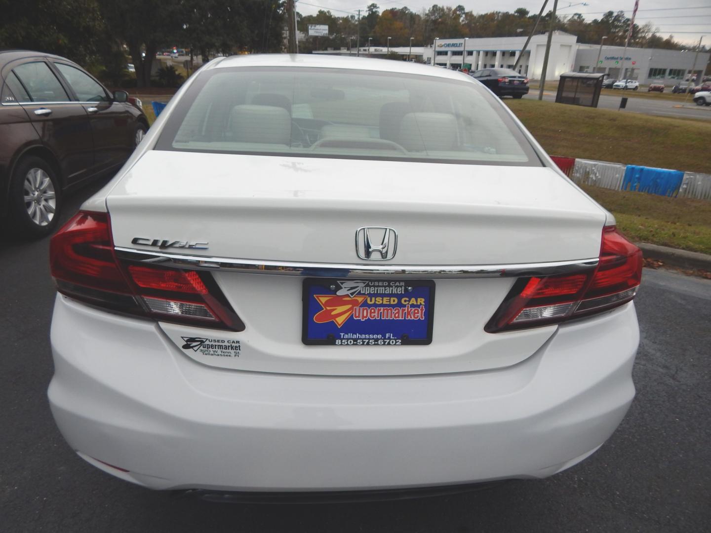 2013 White /Tan Honda Civic LX (19XFB2F57DE) with an 1.8L -4 cyl. engine, Automatic transmission, located at 3120 W Tennessee St, Tallahassee, FL, 32304-1002, (850) 575-6702, 30.458841, -84.349648 - Used Car Supermarket is proud to present you with this loaded immaculate 2013 Honda Civic LX sedan with low miles. Used Car Supermarket prides itself in offering you the finest pre-owned vehicle in Tallahassee. Used Car Supermarket has been locally family owned and operated for over 48 years. Our Ci - Photo#2